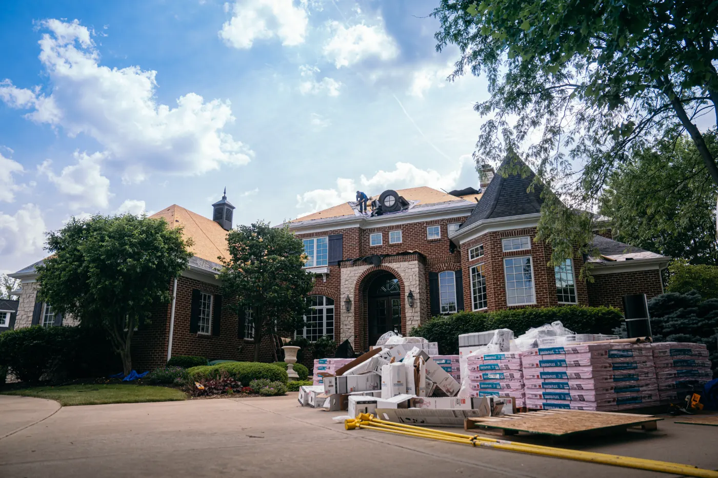 Tarping and dry-in on a Gas City commercial roof